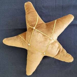 STAR PILLOW tan with gold and pearl trim like new condition